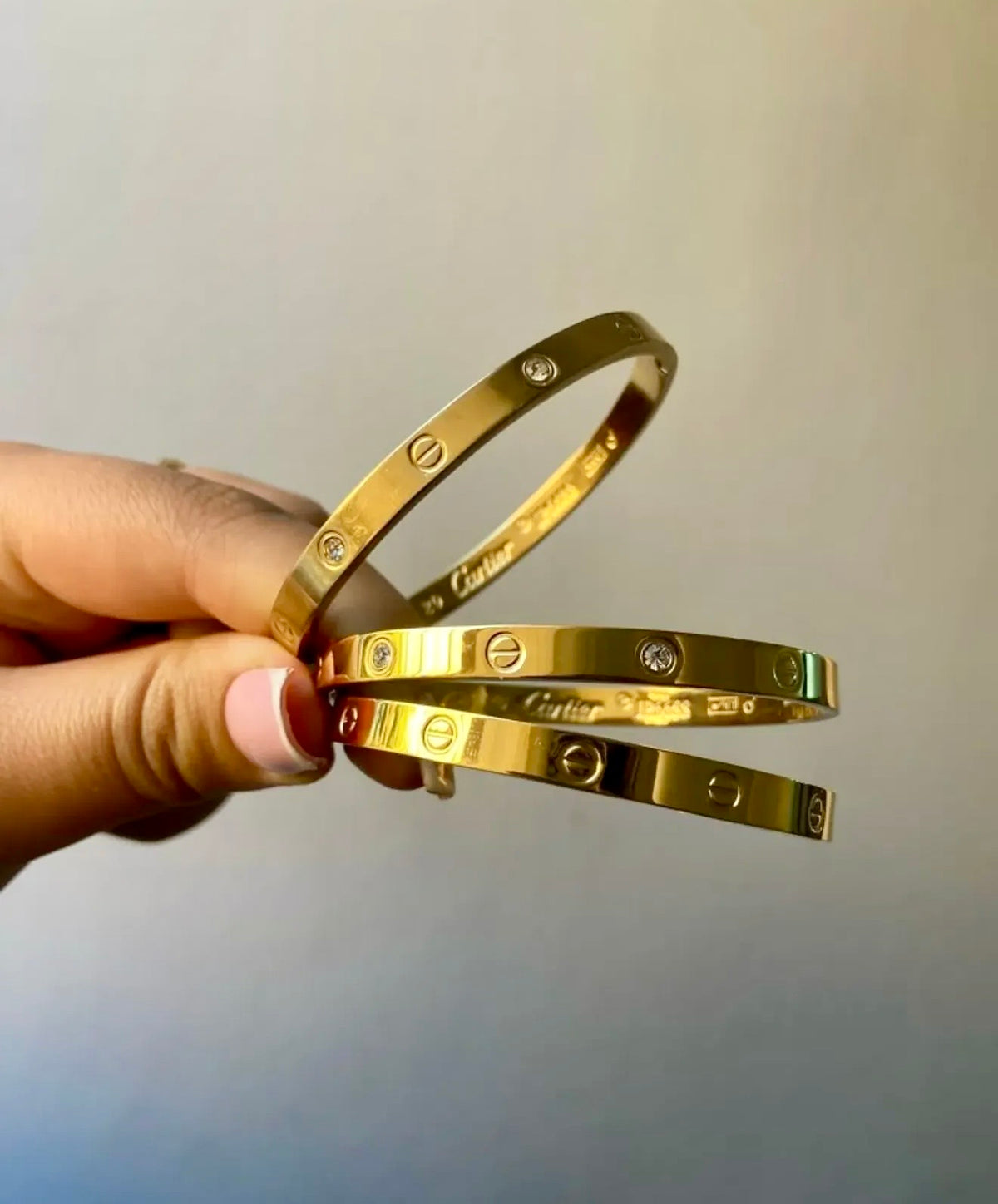 Elegant Gold Screw Bangle